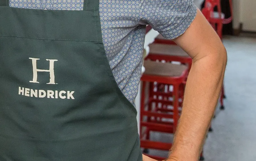 Logo en huisstijl Hendrick, op werkkleding